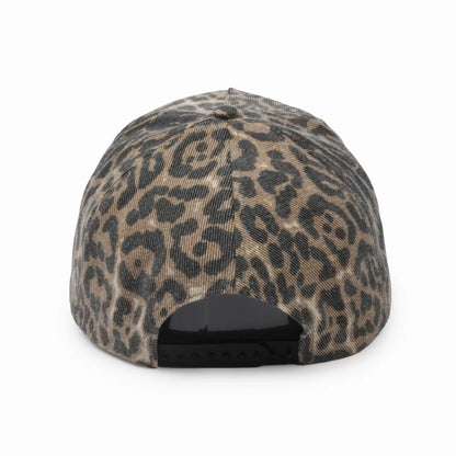 Leopard print cap on a white background