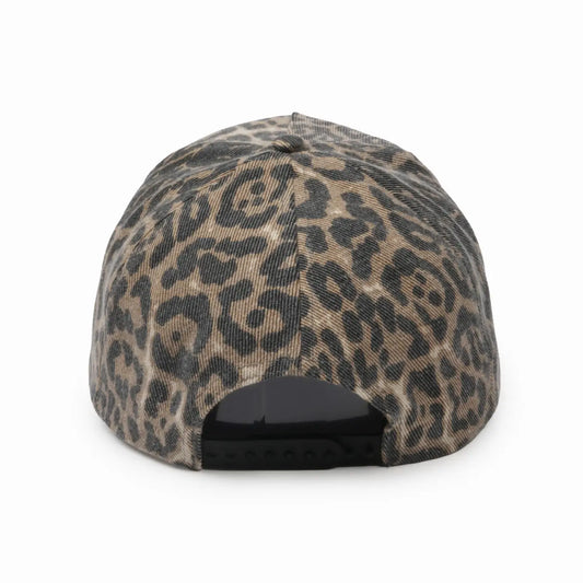 Leopard print cap on a white background