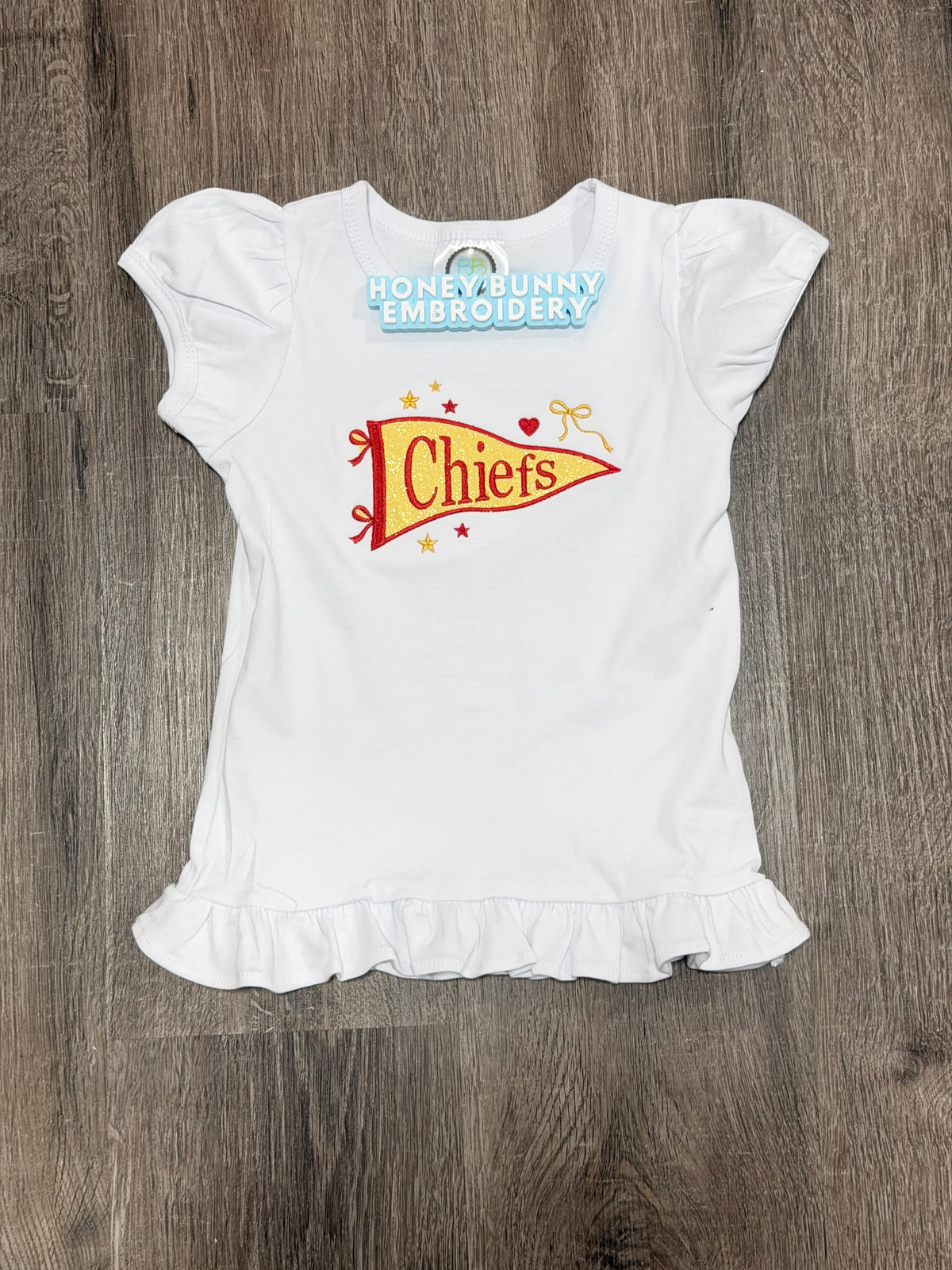 Chiefs Glitter Pennant Girls Ruffle Tee