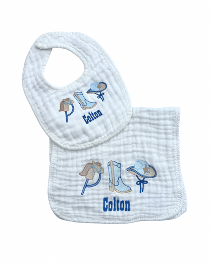 Baby bib and burp cloth set with cowboy-themed designs and 'Colton' text on a white background