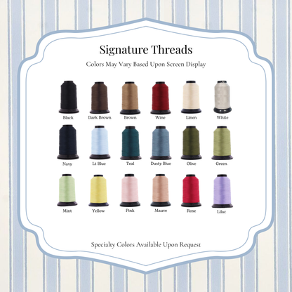 Collection of thread spools with color swatches on a striped background
