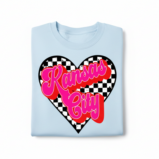 White sweatshirt with a red and pink 'Kansas City' design on a white background