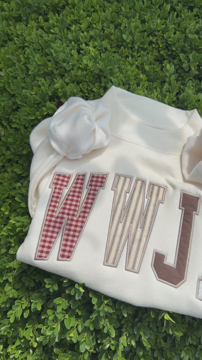 WWJD appliqué mockneck sweatshirt